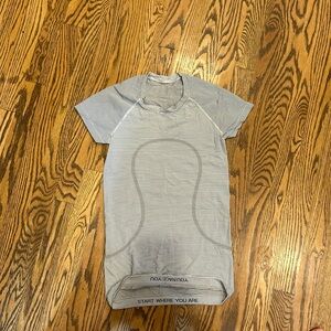 Women’s short sleeve lululemon swiftly tech: size 2, black and white stripped.